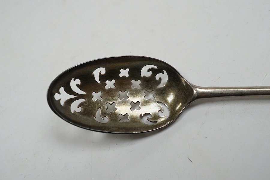 An 18th century silver mote spoon, indistinct maker's mark, with engraved initials, 12.6cm. Condition - fair to good